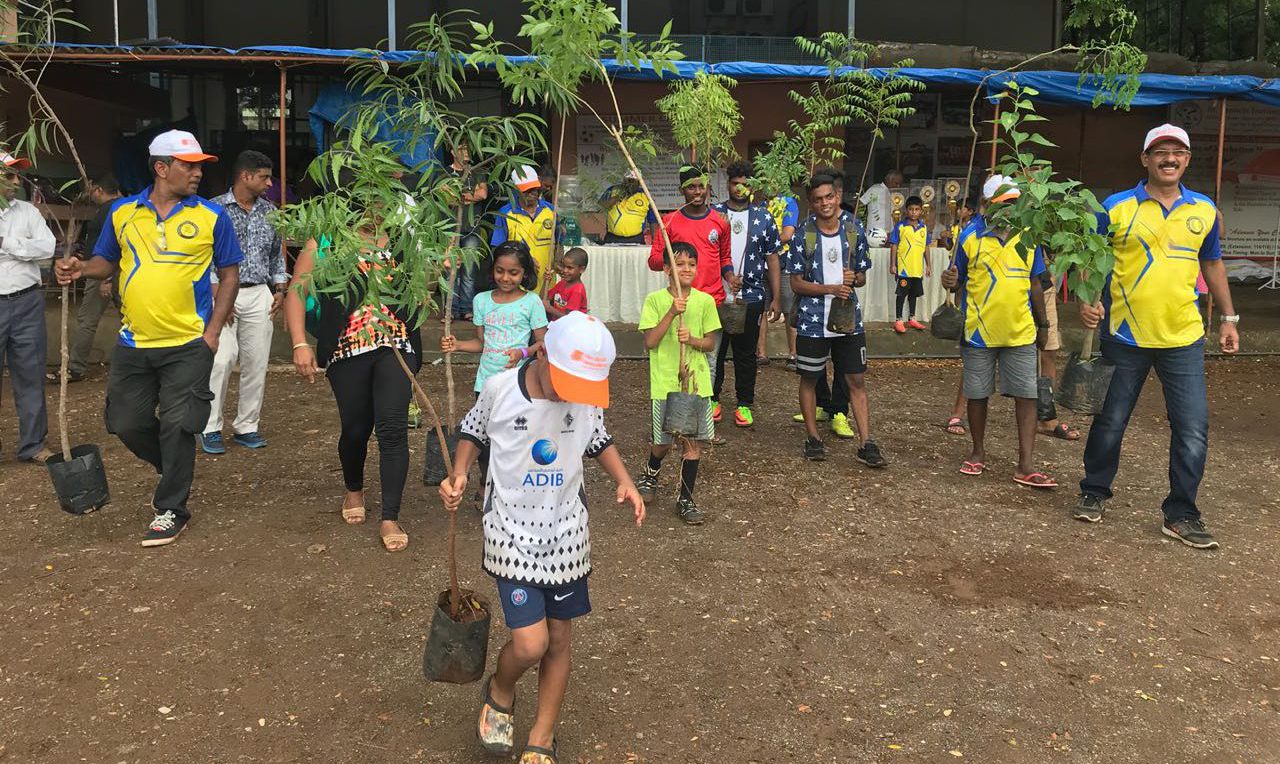 BPFL - Young kids enthusiastically carry saplings for tree plantations - A Borivali sports foundation initiative towards mother nature